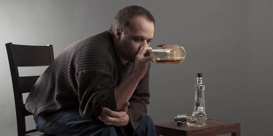 a man drinking alcohol as if to quit