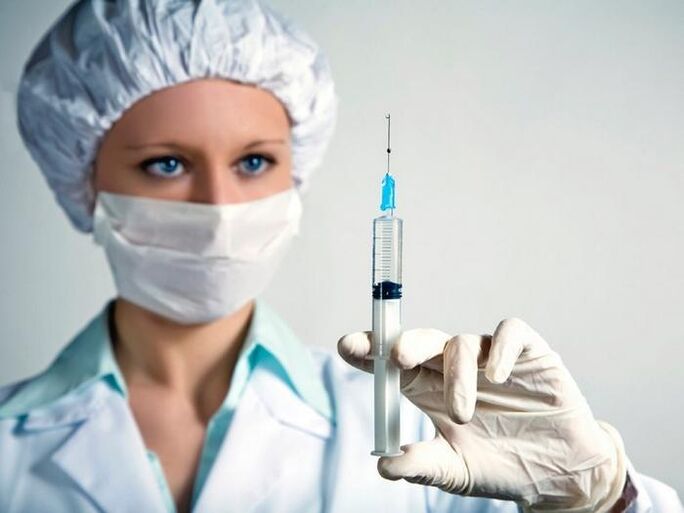 vaccine and alcohol syringe